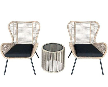 Two wicker chairs with black cushions and a matching side table on a white background